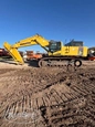 Back of used Excavator,Used Komatsu,Side of used Komatsu Excavator,Used Komatsu under sun,Side of used Excavator